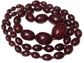 Simulated cherry amber graduated oval bead necklace