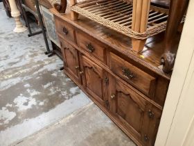 Reproduction oak sideboard in the manner of Titchmarsh & Goodwin