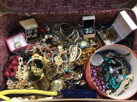 Vintage suitcase containing a quantity of costume jewellery