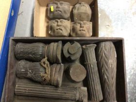Four carved oak 'Green Man' corbels, together with a group of carved columns/furniture parts