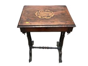 Victorian figured walnut sewing table and a rosewood sewing table