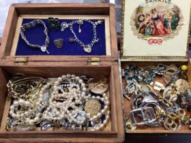 Group of costume jewellery including a silver charm bracelet, silver gate bracelet and other bijoute