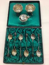 Set of six silver coffee bean spoons in fitted case, pair of silver salts and a silver mustard with