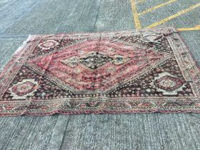 Large Persian rug, approximately 200cm x 277cm