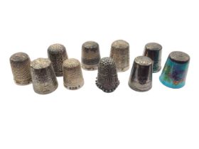 Ten silver and white metal thimbles including one Niello and one enamelled