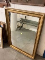 Gilt framed wall mirror