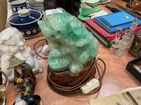 Chinese green hardstone lamp in the form of a Dog of Foo