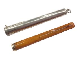 1920s silver cheroot holder containing an amber cheroot with 9ct gold mount