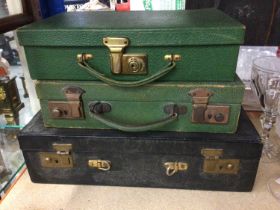 Three vintage leather stationary cases