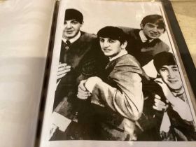 Album of Beatles pictures, tin plate signs etc