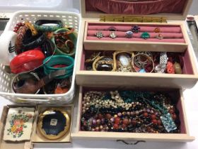 Jewellery box containing costume jewellery, brooches, various beads, bangles, rings and wristwatches