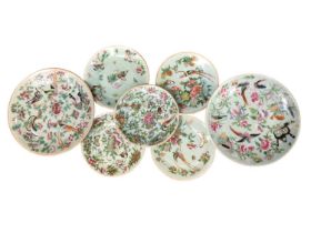 Seven late 19th century Chinese famille rose celadon-glazed porcelain dishes, decorated with flowers