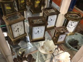 Five brass carriage clocks