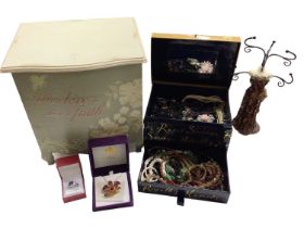 Two jewellery boxes containing costume jewellery and a small mannequin jewellery stand