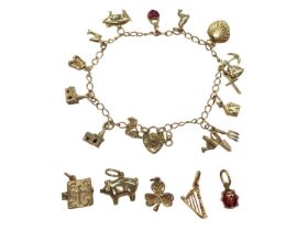 9ct gold charm bracelet with various charms, some loose