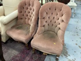 Two Victorian nursing chairs with buttoned velvet upholstery