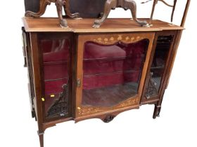 Edwardian art nouveau mahogany display cabinet with carved and inlaid decoration.