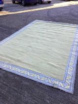 Large rug with blue patterned border, 470cm x 298cm
