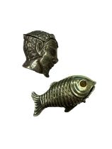 Two novelty silver plated vestas, one in the form of a fish, the other a devil