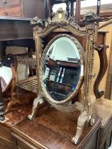 Giltwood framed swing mirror with oval bevelled plate