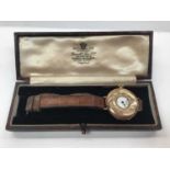 Early 20th century 9ct gold half hunter Elgin wristwatch on leather strap in box