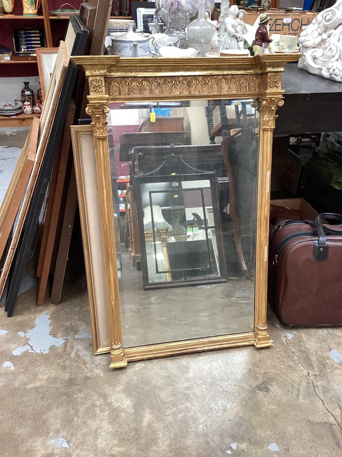 19th century pier mirror with bevelled plate in gilt frame, 60cm wide, 90cm high