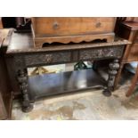 Late Victorian carved oak hall table with two drawers