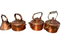 Four various copper kettles