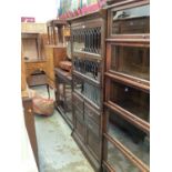 1920s Barrister bookcase with three leaded glazed doors and four drawers and cupboards below