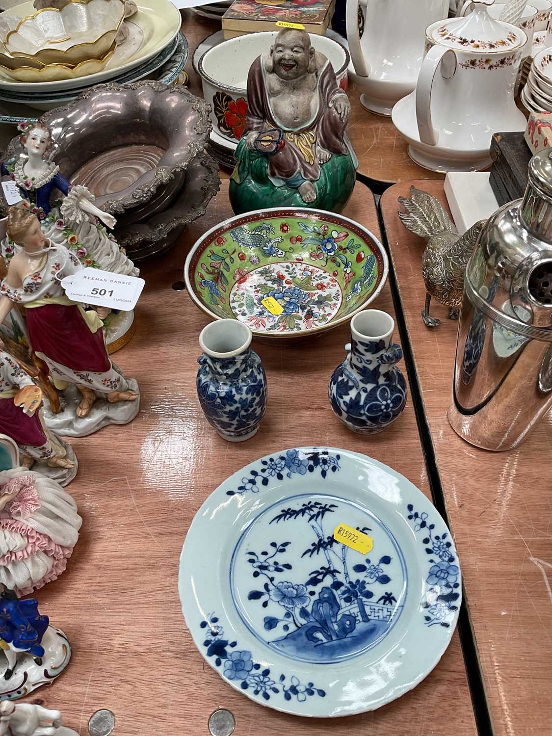 Clobbered Chinese porcelain bowl, blue and white porcelain plate, vases and seated Buddha figure