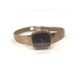 9ct gold Tissot quartz wristwatch on an integral 9ct gold bracelet