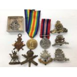 First and Second World War medals, together with various military badges