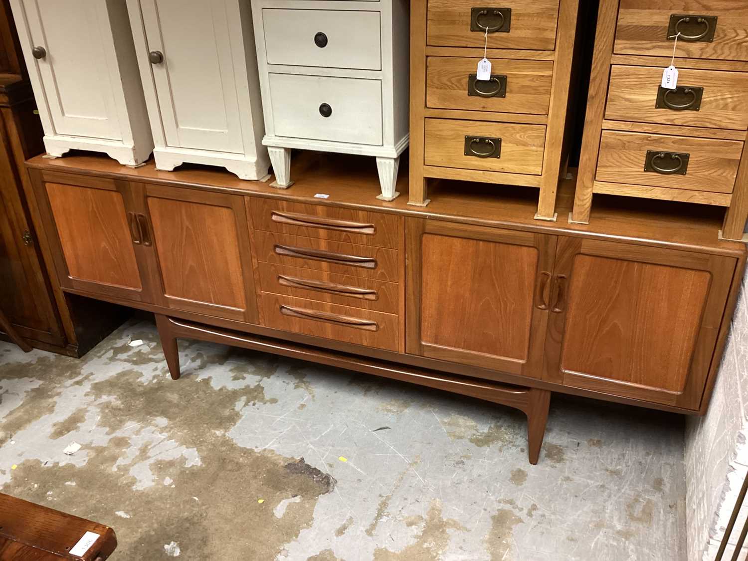 1970's G-Plan teak sideboard with four central drawers flanked by cupboards, 213cm wide, 46cm deep,