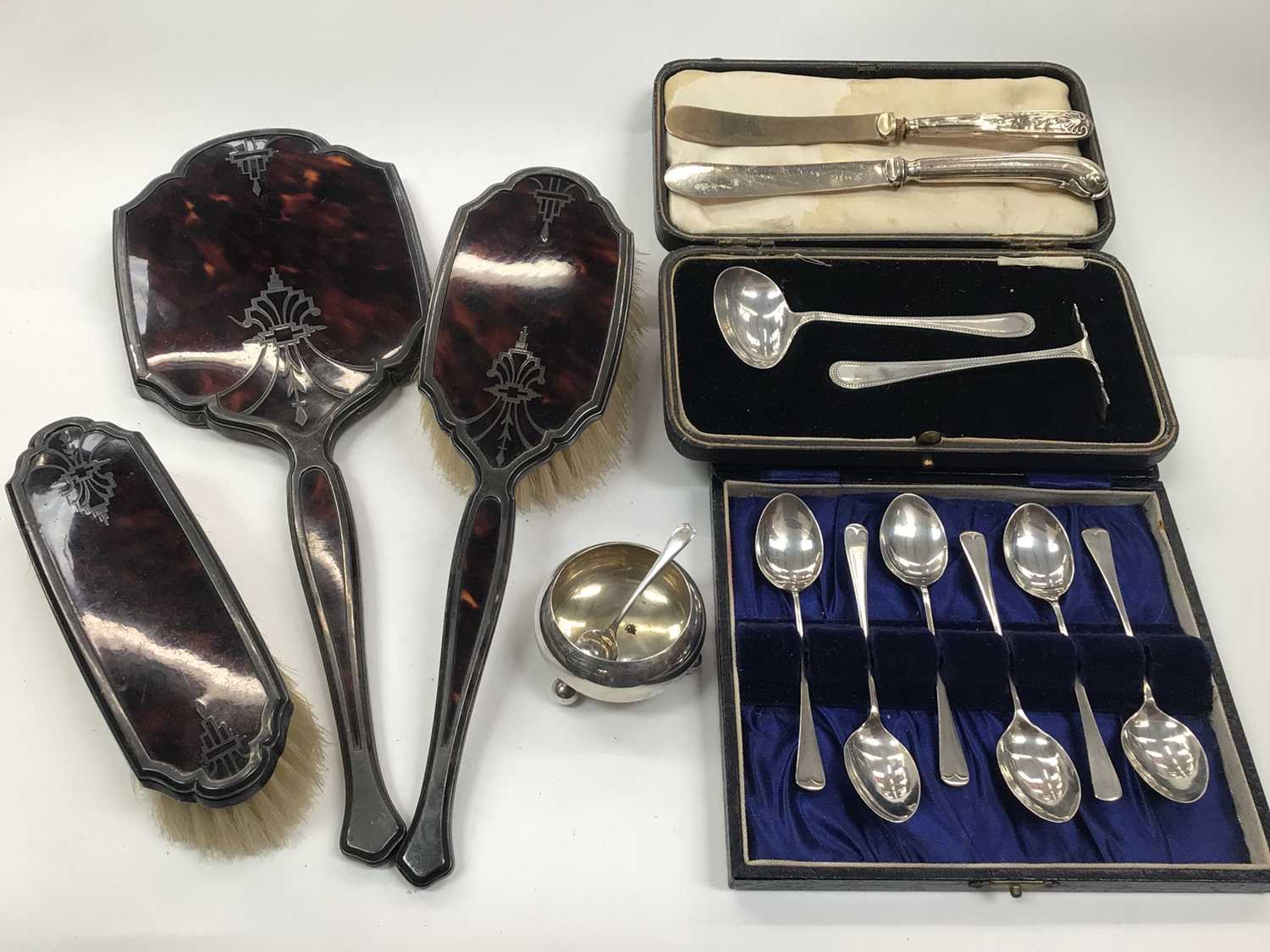 Tortoiseshell and silver hand mirror and brushes, together with silver teaspoons and other items