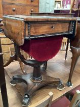 Victorian rosewood needlework table with single drawer and pull out well below on turned column and