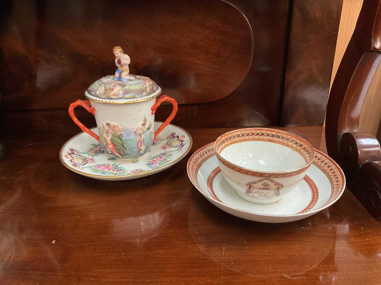 Capodimonte relief decorated chocolate cup and saucer, and a Chinese export tea bowl and saucer with