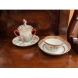 Capodimonte relief decorated chocolate cup and saucer, and a Chinese export tea bowl and saucer with