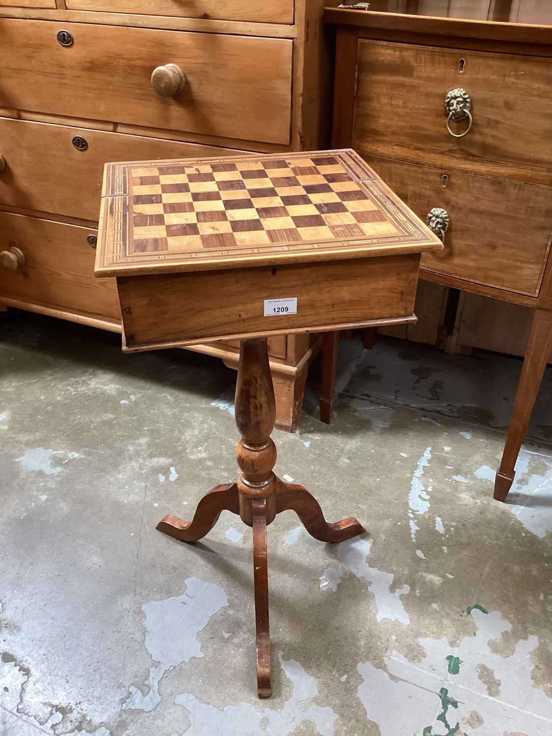 Victorian inlaid games table on tripod base