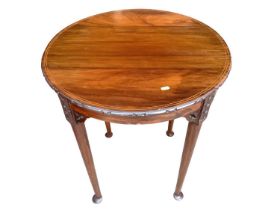 Edwardian mahogany circular lamp table