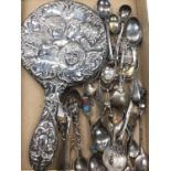 Silver hand mirror and collection of silver and other souvenir spoons