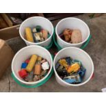 Circular tubs of toys and boxed toy cars