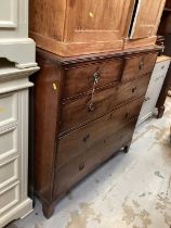 George III mahogany chest of two short and three long drawers with brass ring handles, on bracket fe