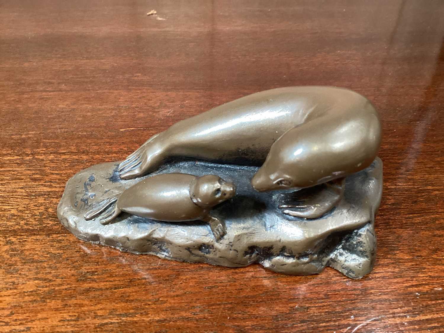 Bronze sculpture Sealions, signed Peter Dykes, plus other resin animals