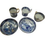 Wedgwood blue printed coffee cup and saucer, and another blue printed trio