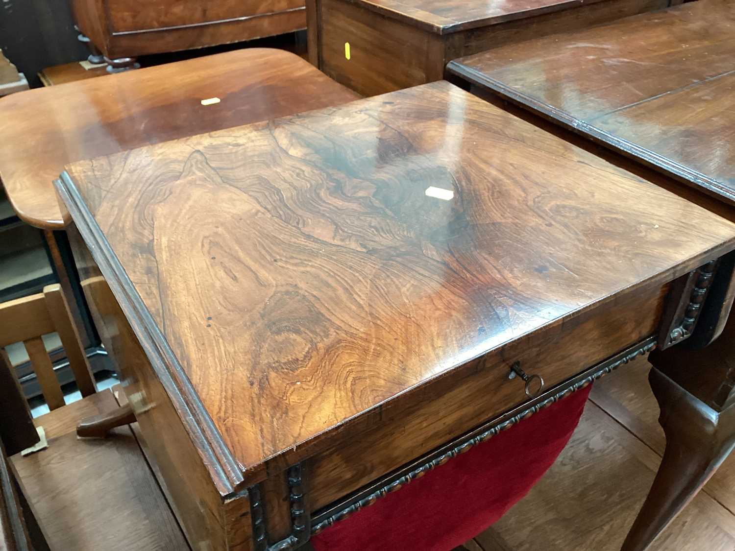 Victorian rosewood needlework table with single drawer and pull out well below on turned column and - Image 2 of 7