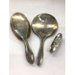 Silver backed hand mirror and brush, together with a small plated brush