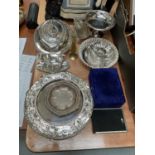 Group of silver plated ware including an oval entrée dish, salvers, gravy boat on stand etc