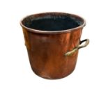 Large antique copper twin handled vessel, 30cm high