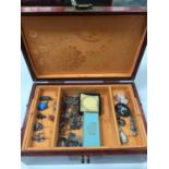 Chinese style wooden jewellery box containing a silver charm bracelet, silver brooches, other antiqu