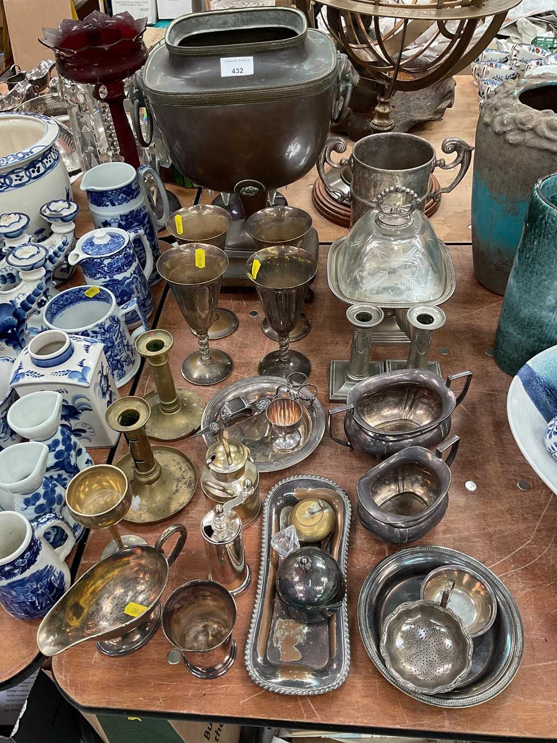 Group of assorted metalware to include silver plated goblets, samovar and other metalware.